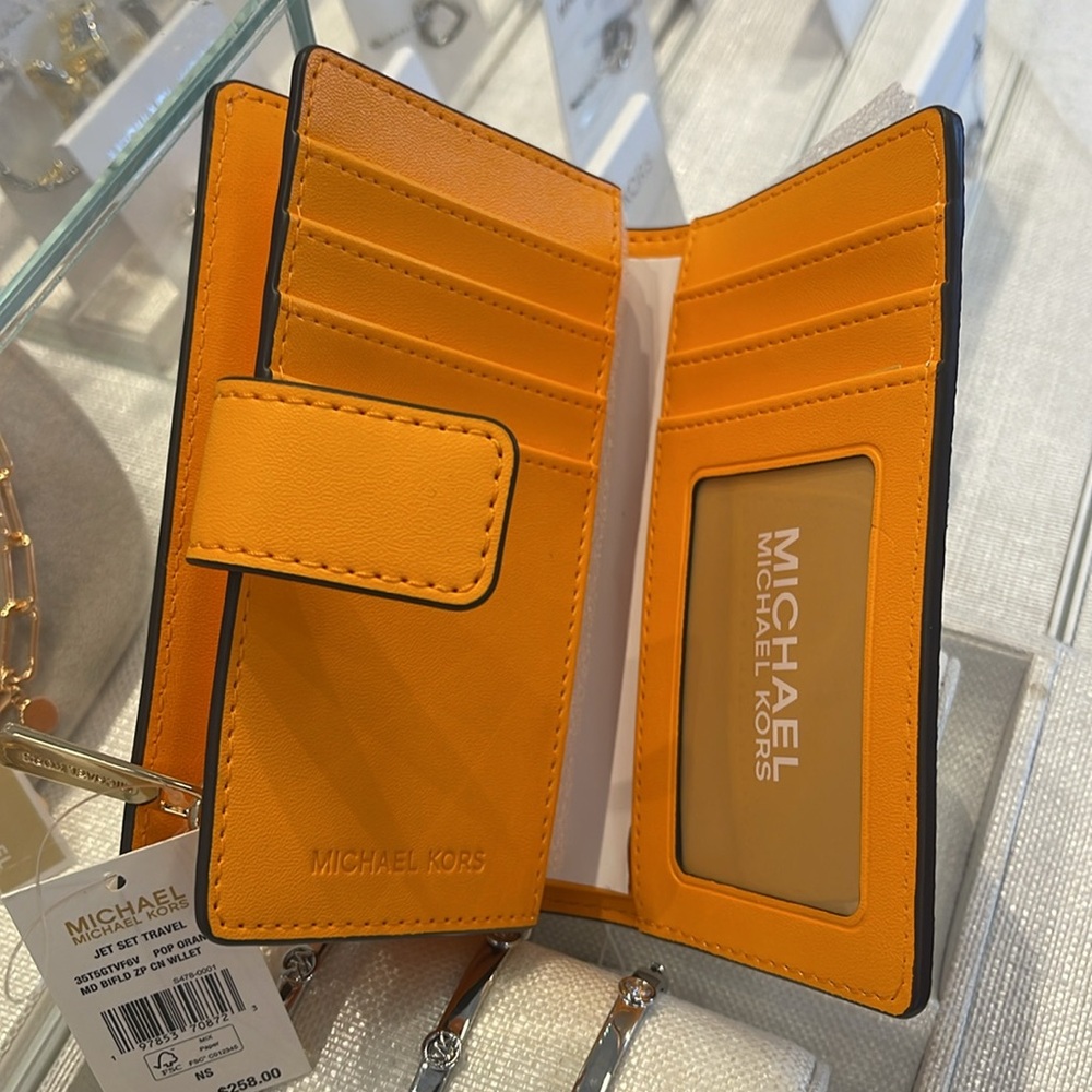 Michael Kors Jet Set Travel Md Printed Signature Logo Bi-Fold Wallet
Pop Orange - Picture 9 of 16